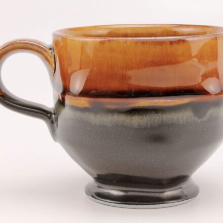 C1417: Main image for Two tone cup..honey and black made by Peter Beasecker